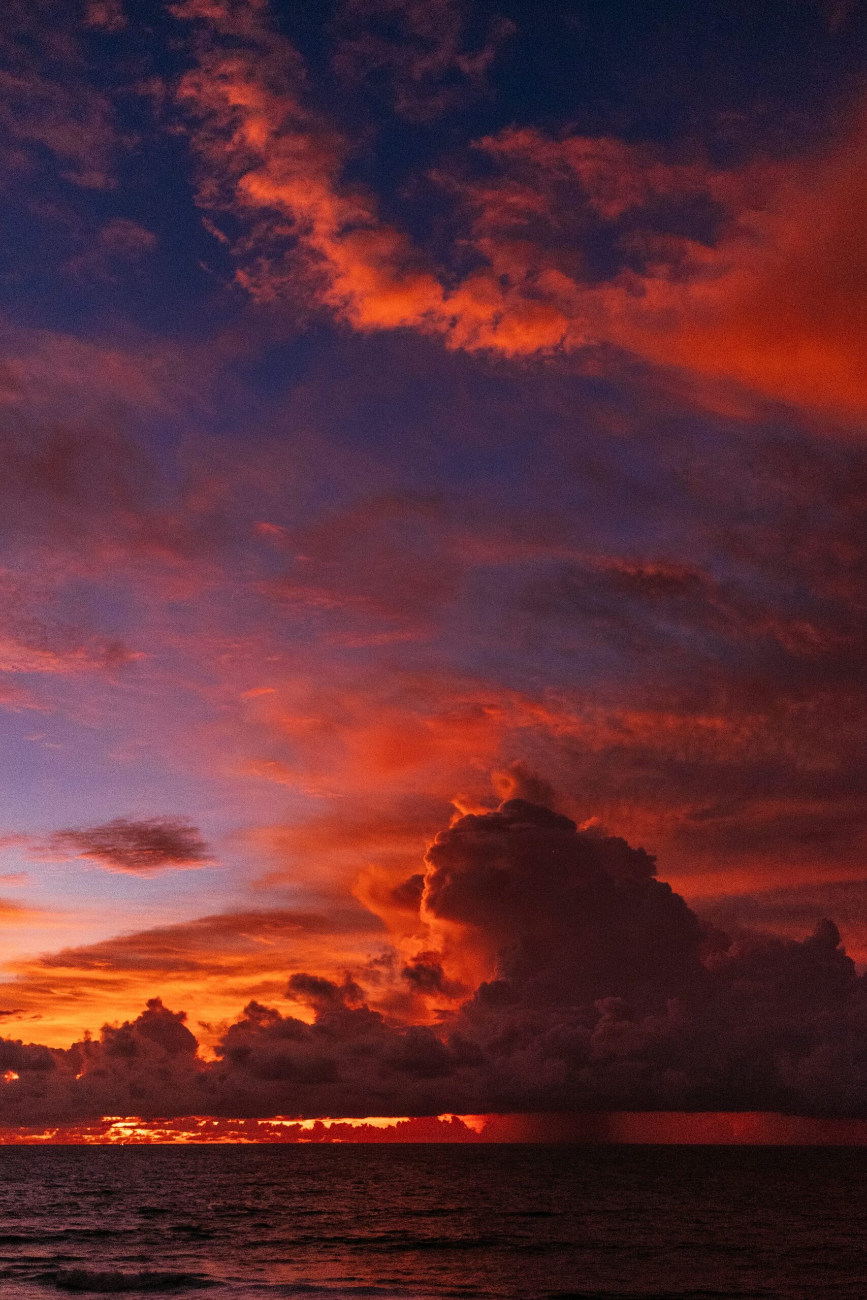 Golden ocean cloudscape — photograph by Tim Marshall, Unsplash